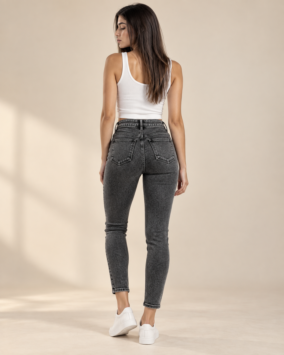 Black skinny ankle jeans back view