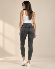 Black skinny ankle jeans back view