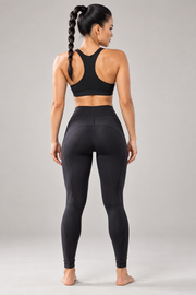 Black sculpting athletic leggings — back view