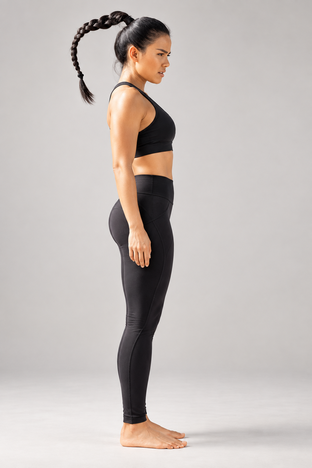 Black sculpting athletic leggings — side view
