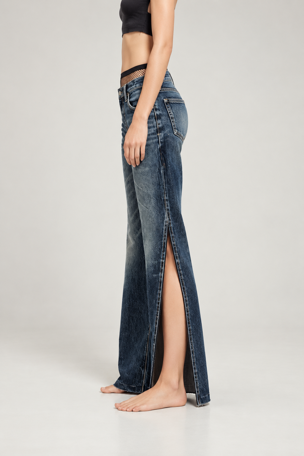 Dark indigo slit wide-leg jeans — side view