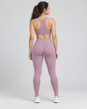Dusty-rose patterned athletic leggings — back view