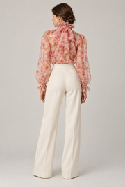 Sheer floral ruffle-bow blouse — back view