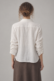 White linen blouse back view