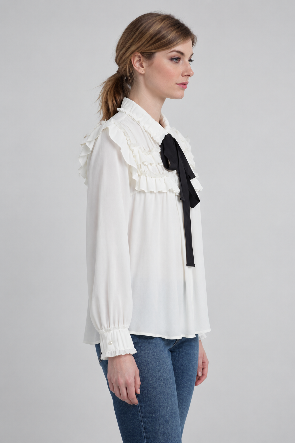 White ruffle blouse side view